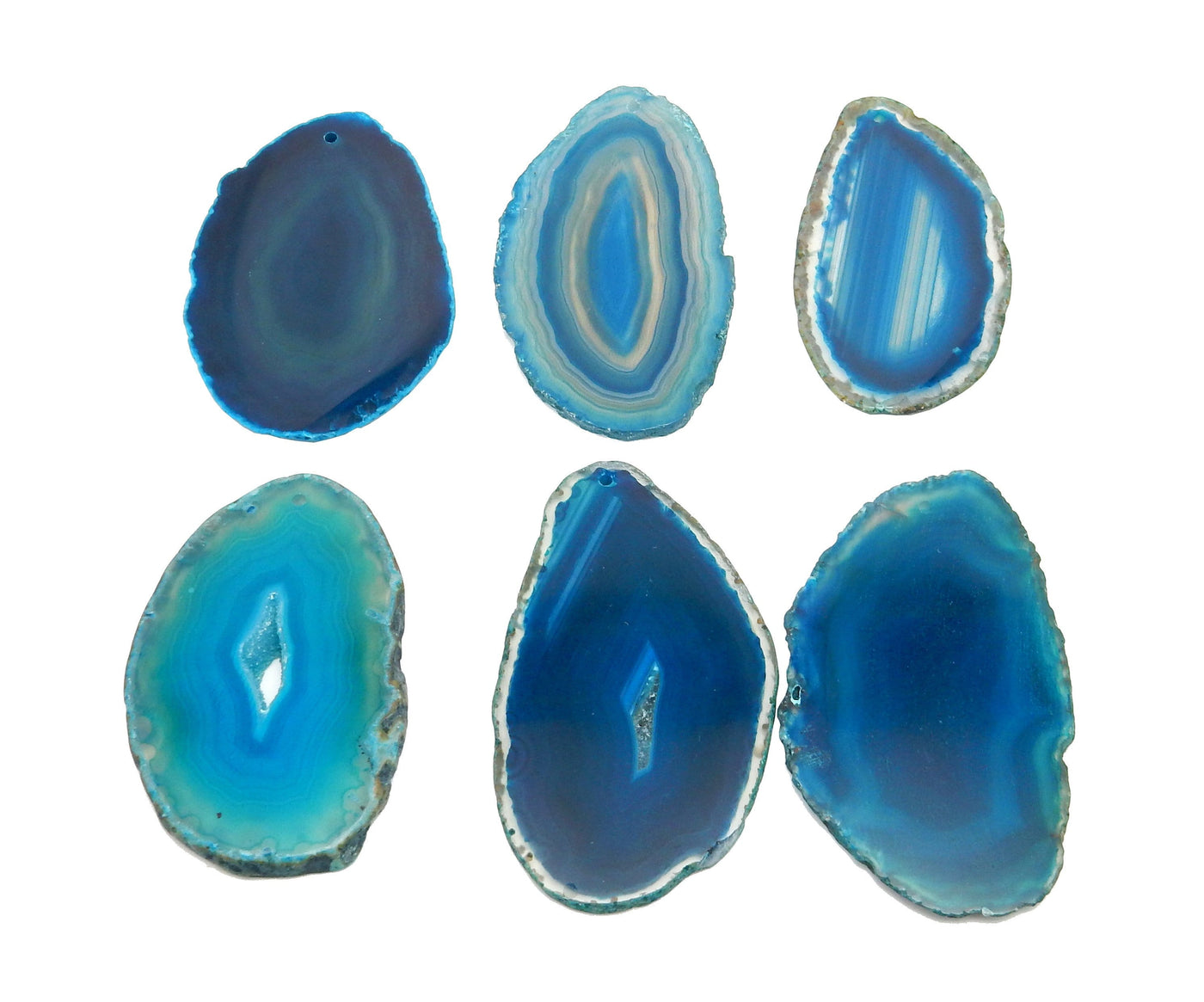 6 Teal Agate Slices Drilled on White Background.