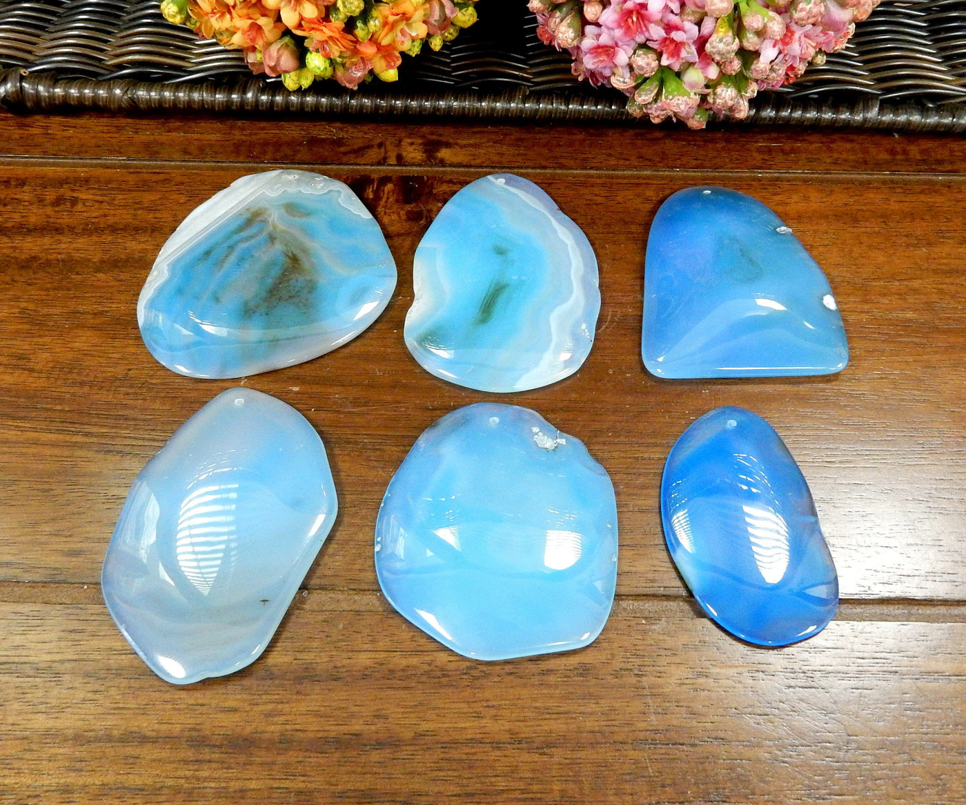 6 Light Blue FreeForm Agate Slices with Polished Edge on Wooden Background.