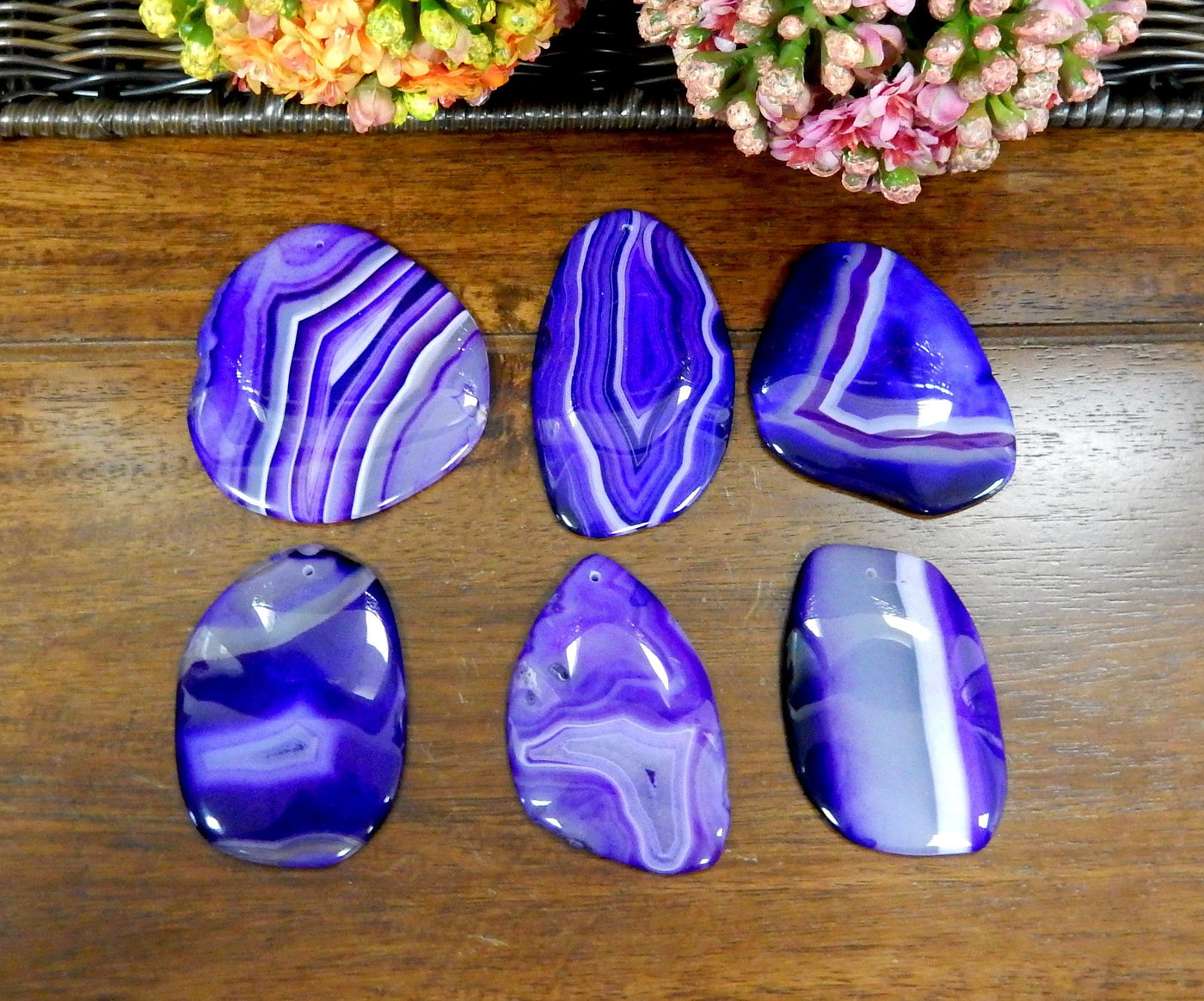 6 Purple FreeForm Agate Slices with Polished Edge on Wooden Background.
