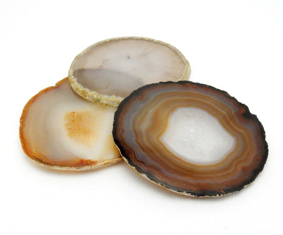  Natural Agate Slice - 3 laying together on a table
