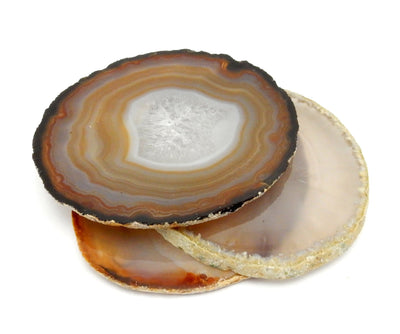  Natural Agate Slice - 3 laying  on a table