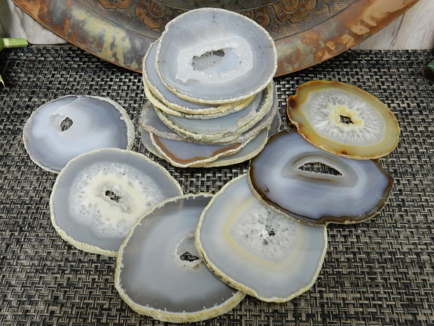 Natural Agate Slices - Extra Grade Polished Agate - Coaster Size with Open Druzy Center - a pile stacked and 6 laying around it