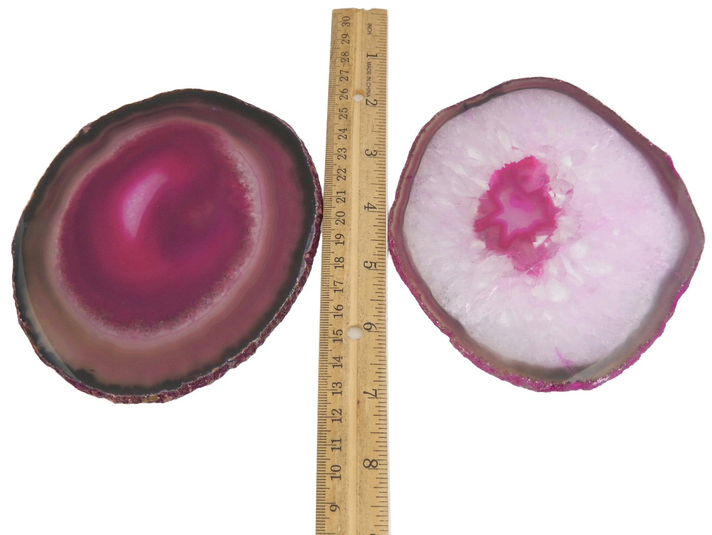 Two Pink Agate Slices #6 next to a ruler for size reference