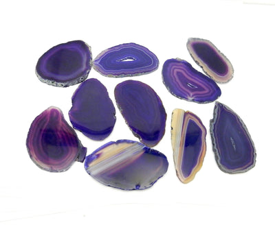 Assorted agate slices on a white background.