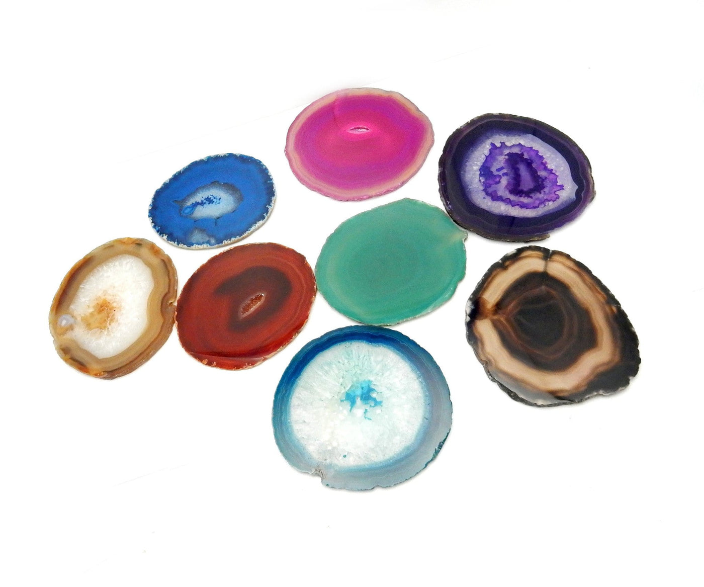 agate slices of different colors on white background