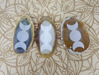 Picture of 3 of our natural agate slice with large moon phase.