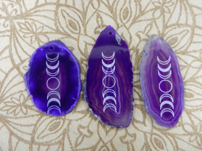 Picture of 3 of our purple agate slices.