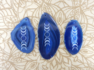 Picture of 3 of our blue agate slices.