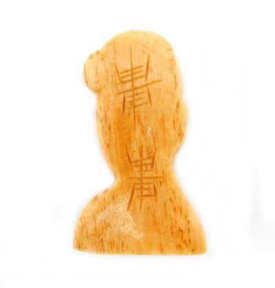 back picture of carved bone woman top to bottom drilled.