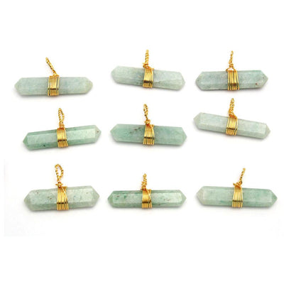 Nine of out amazonite gold pendants being displayed on a white background.