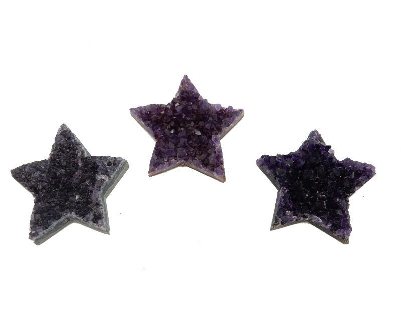 3 amethyst druzy stars on white background