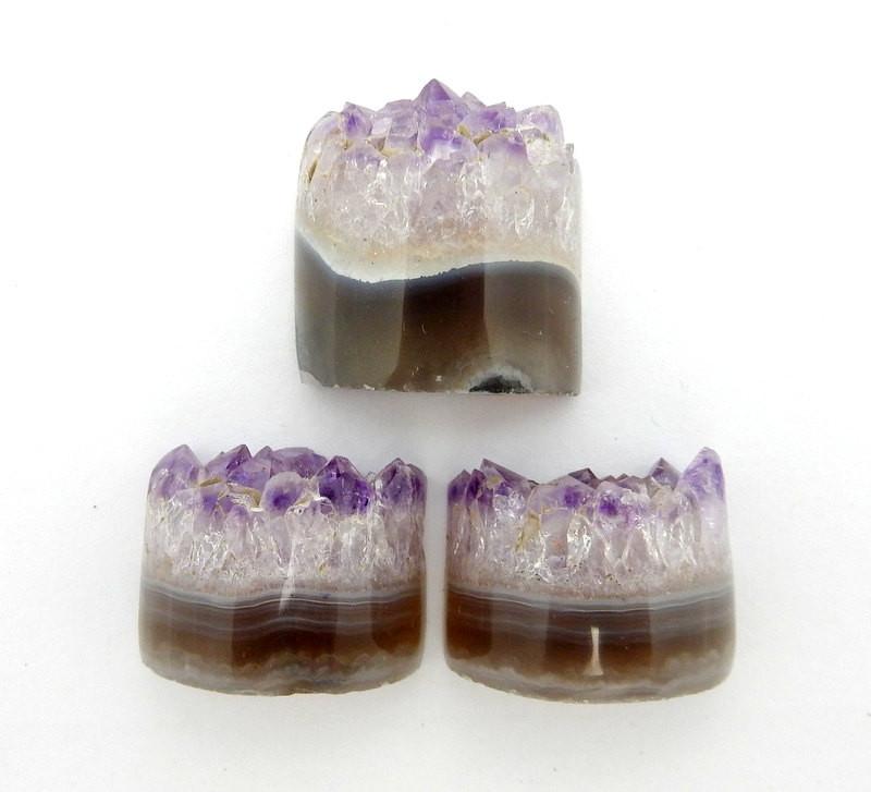 amethyst half cylinders on white background