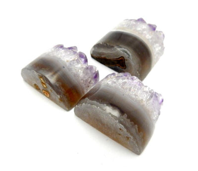 amethyst half cylinders on white background