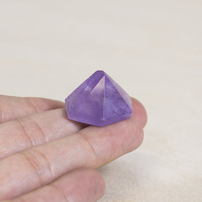 Hexagonal Gemstone Pyramid in hand to show size reference