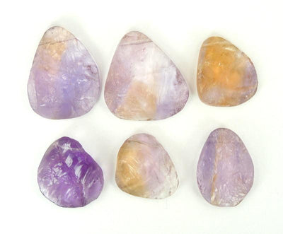 multiple Ametrine Top Side Drilled Stone Bead displayed on white background to view various characteristics such as color size thickness shape texture and natural inclusions