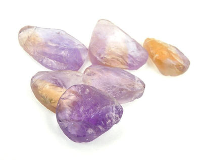 side view of multiple Ametrine Beads for thickness reference