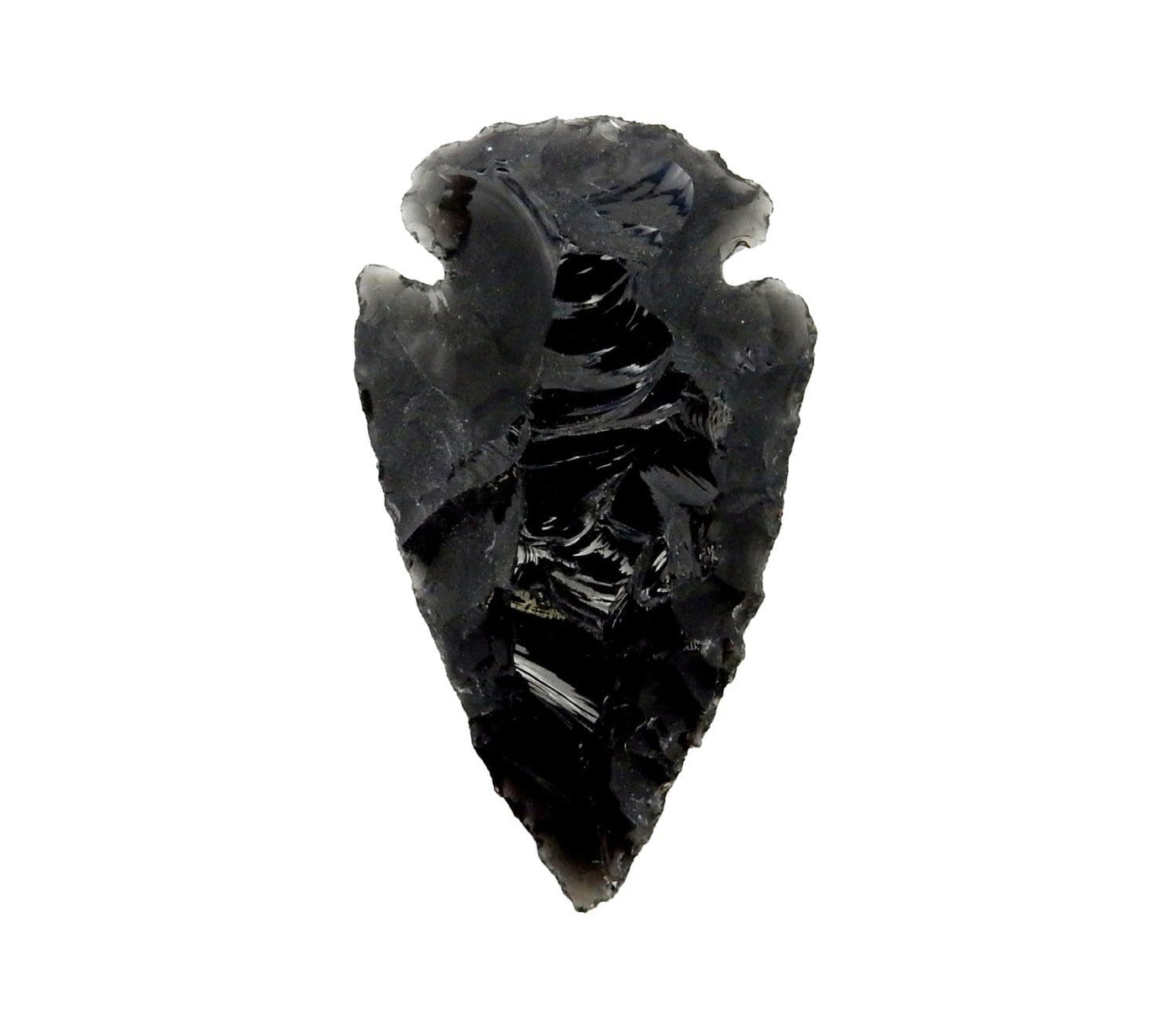 One black obsidian arrowhead on a white background.