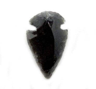 back obsidian arrowhead on white background