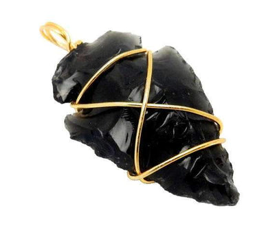 black obsidian arrowhead stone wrapped with gold tone wire side view for thickness reference