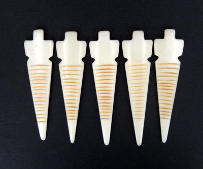 Arrowhead Pendant - Bone Spike - Carved Bone Spike Top Side Drilled Bead - Top view of multiple arrowhead pendants 