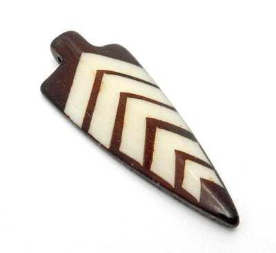 Side view of 1 Arrowhead Pendant in white And Brown with a Drilled Top Side 