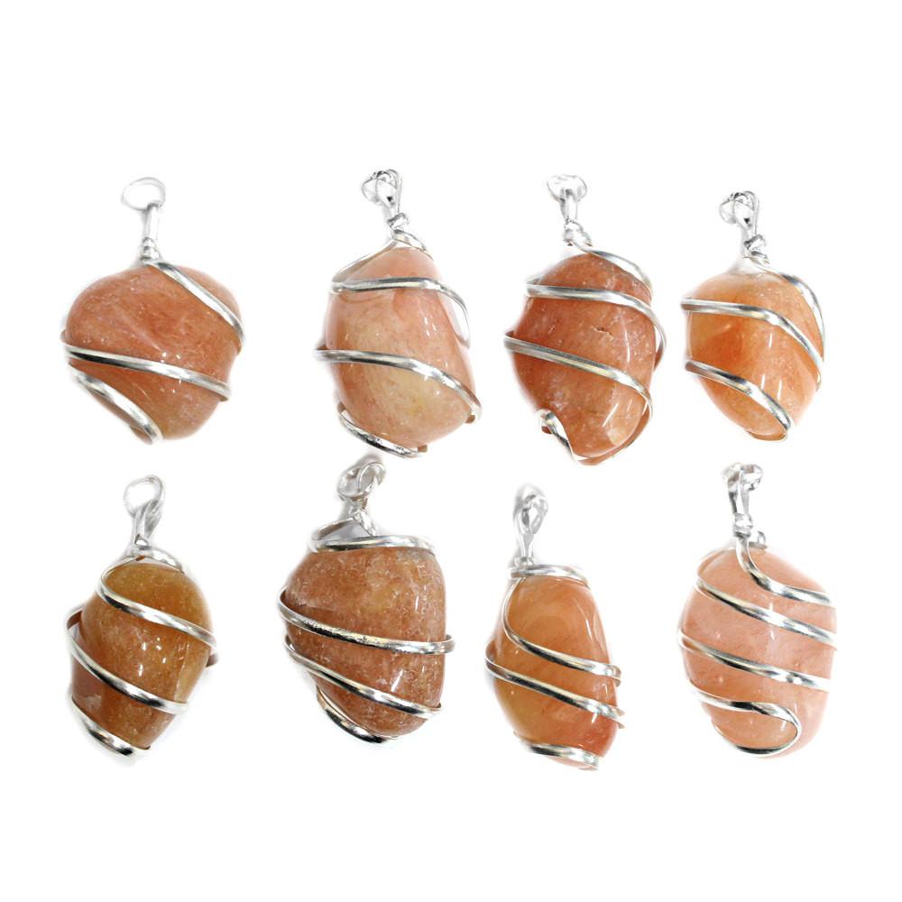 8 Aventurine Silver Tone Spiral Tumbled Peach Aventurine Pendants on white background