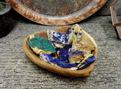 azurite stones in a wooden heart bowl