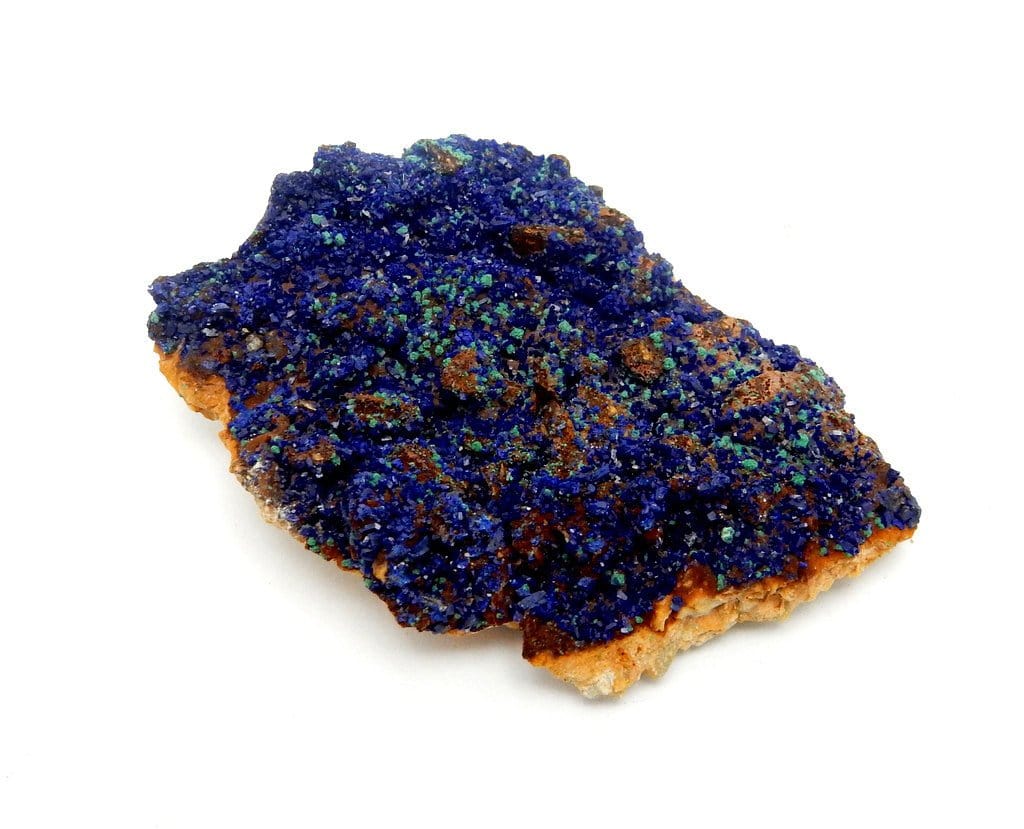 up close shot of azurite stone on white background