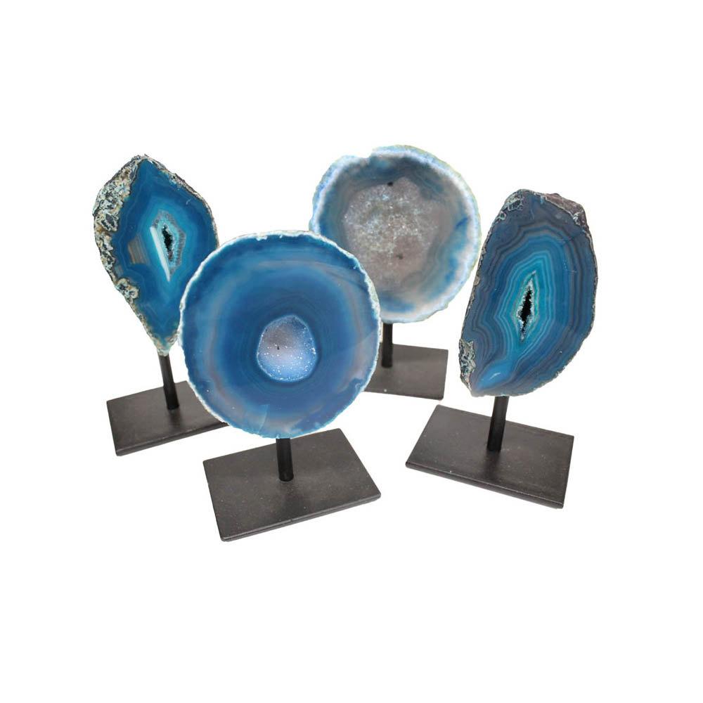 Four front facing agate geodes displaying color, shape and pattern variations. The product is displayed with a white background.