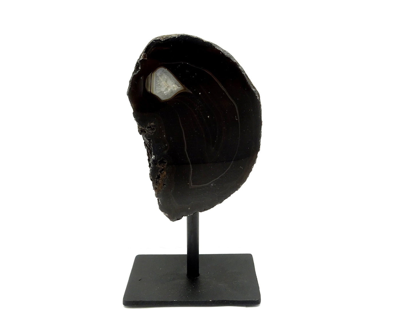 One front facing agate geode on metal base with a white background.