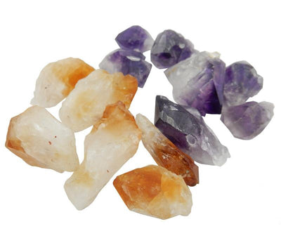 Amethyst and citrine assorted points on a white background.