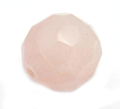 Up close shot of Rose Quartz Bead on white background