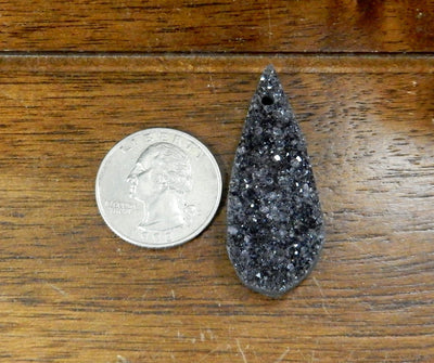 Druzy Teardrop Top Center Drilled Bead shown next to quarter to reference size