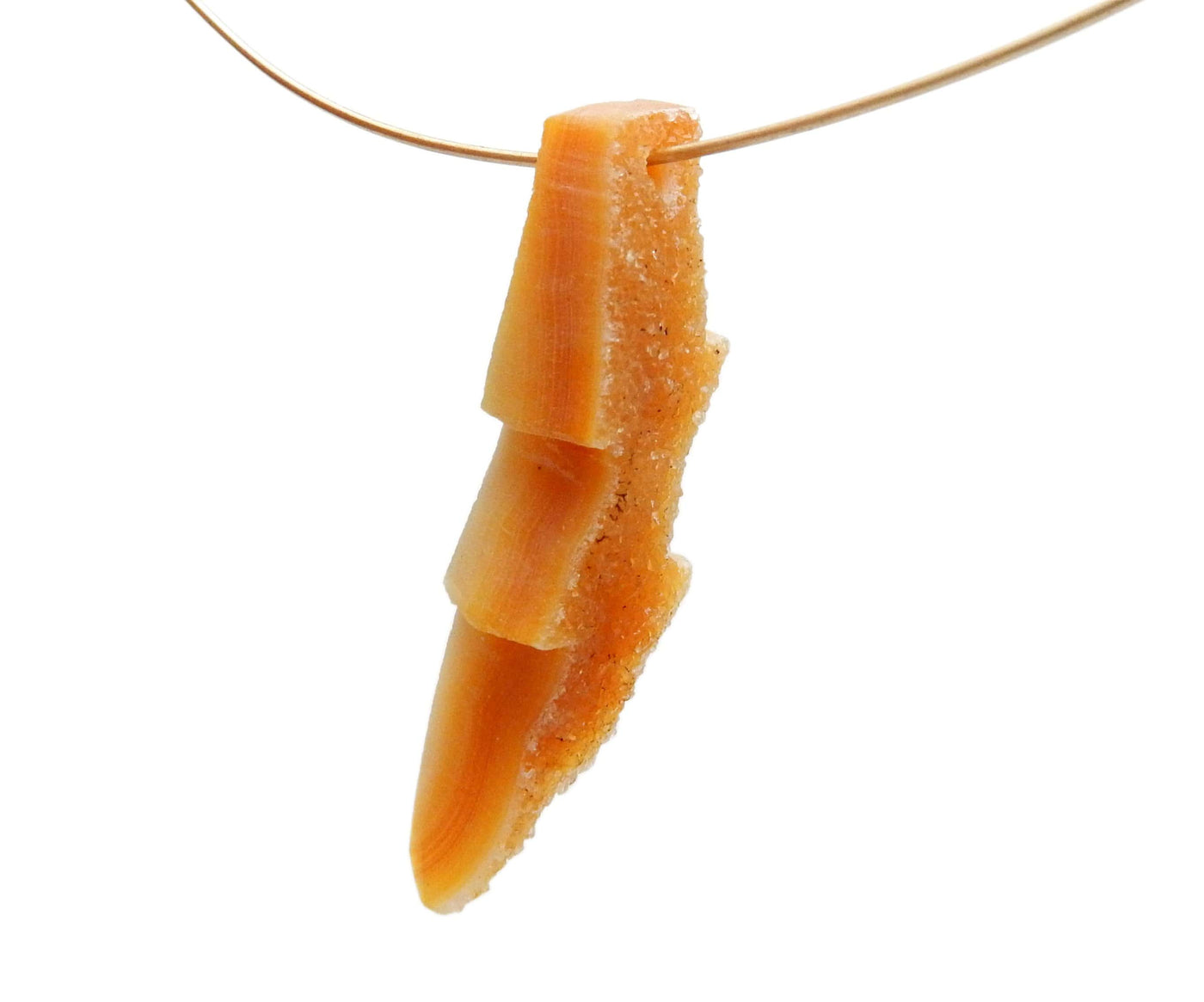 Orange Druzy Lightning Bolt Shaped bead up close side view to show thickness and details of the natural stone