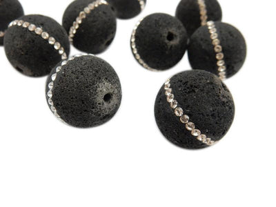 Close up view of a few Petite Round Lava Rock Bead With CZ Rhinestone Accent Band