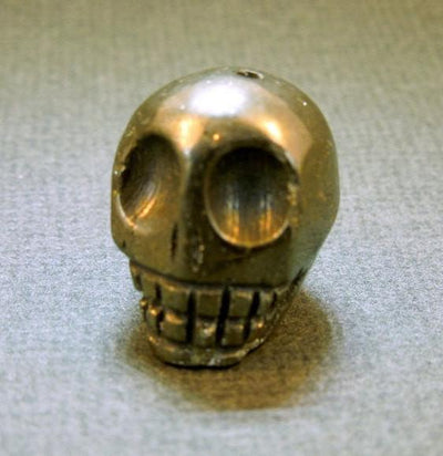 close up of one hematite skull bead for details