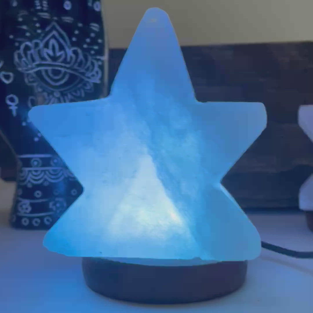 video of himalayan salt white star lamp plugged in to show multicolor changing light
