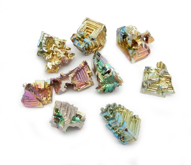 multiple bismuth crystals showing different sizes and colors 