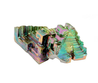 close up of a bismuth crystal showing the texture and rainbow colors 