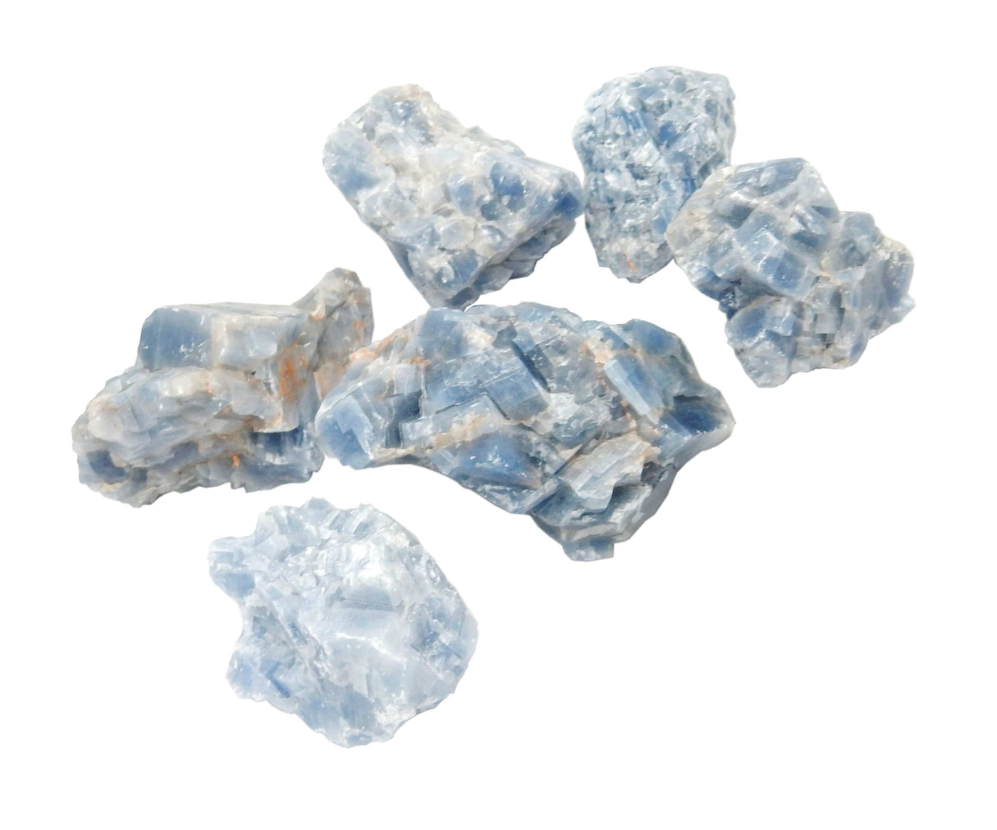 6 blue calcite stones on white background
