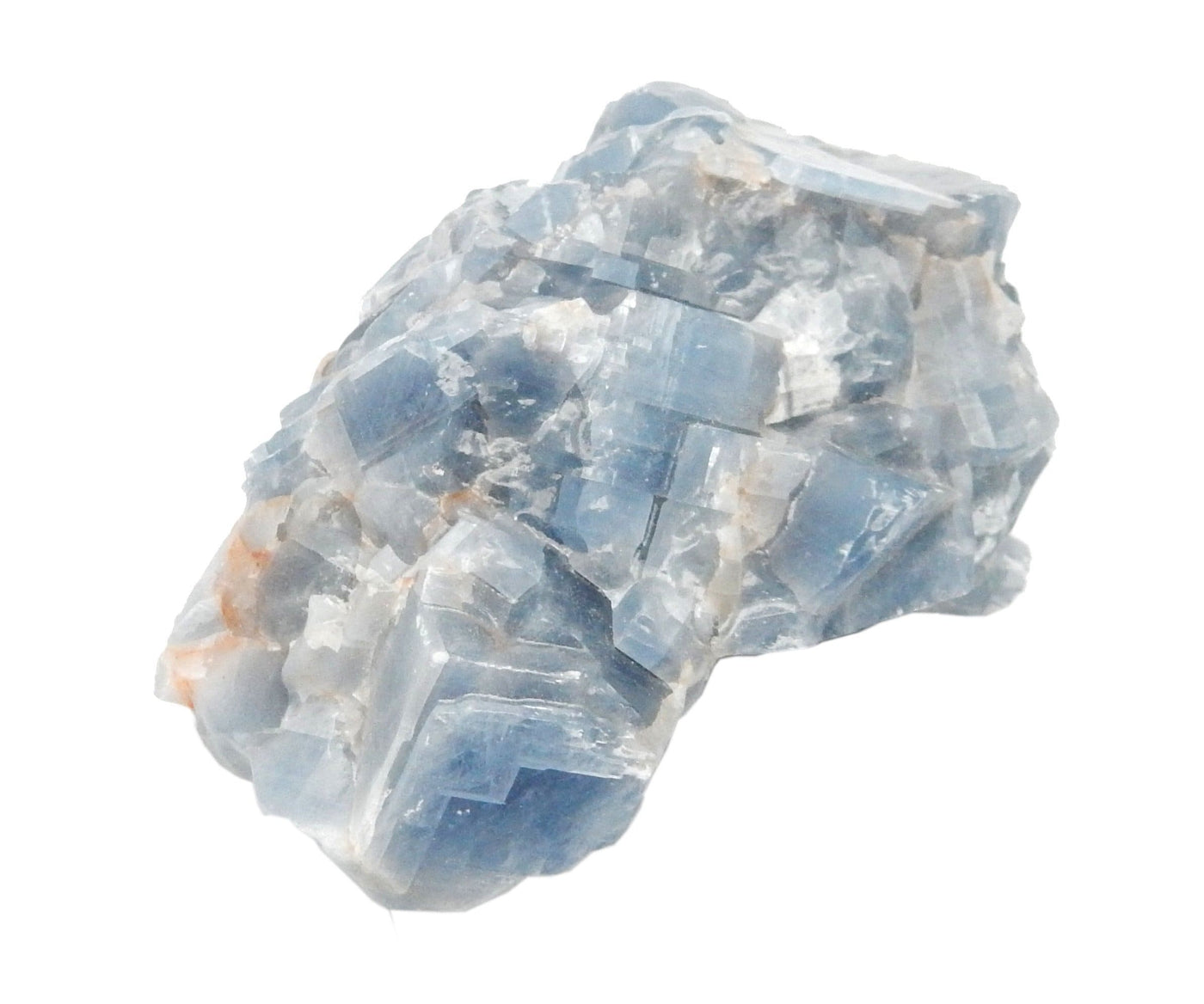 up close shot of blue calcite stone on white background