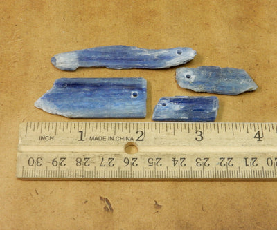 Blue Kyanite Blades Top Drilled Beads next to a ruler for size reference