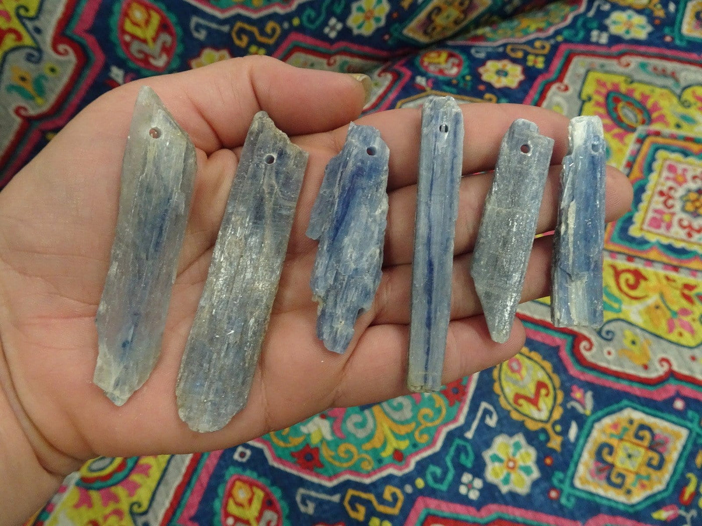 Blue Kyanite Blades Top Drilled Beads in a hand for size reference