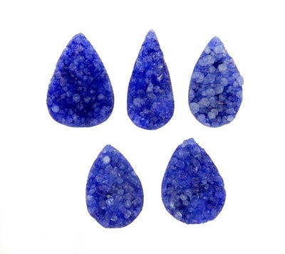 purple tear drop druzy drilled beads on white background