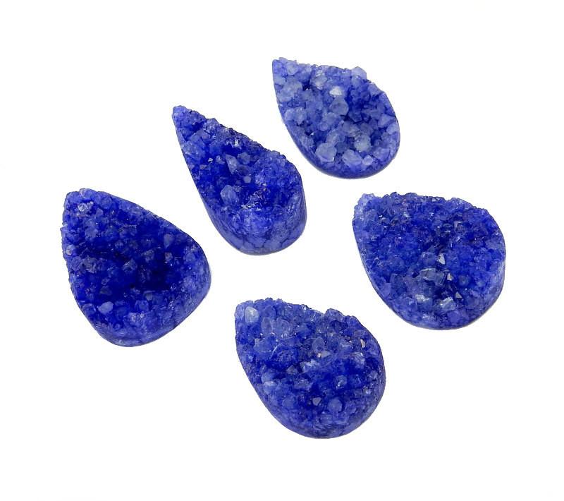 purple tear drop druzy drilled beads on white background