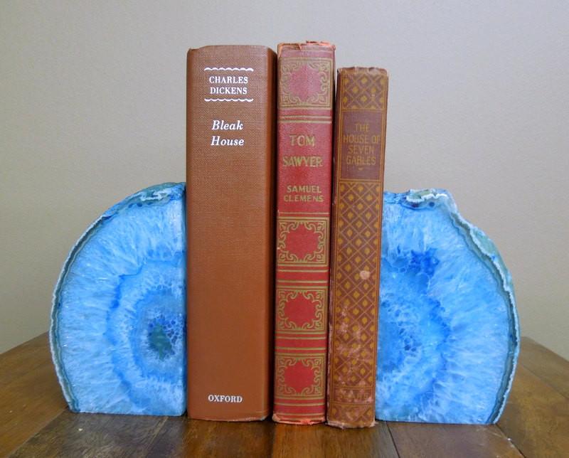 Blue Agate Book End shown holding books.