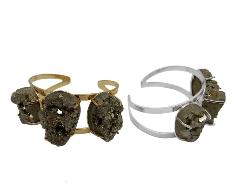 2 pyrite bracelets next to each other