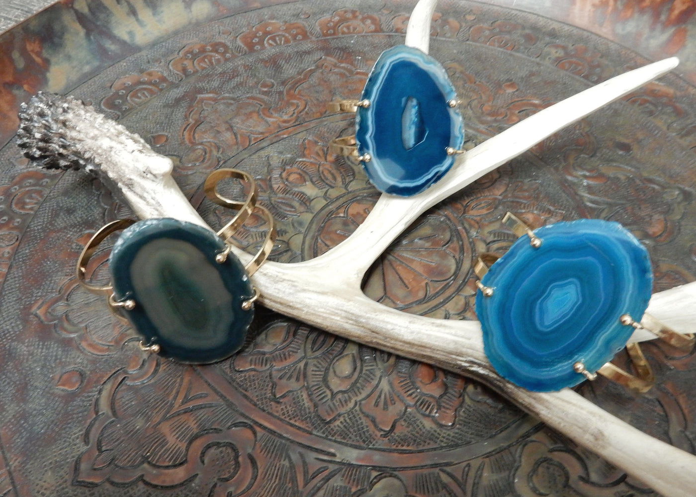 Blue Agate Slice on Electroplated 24k Gold Adjustable Bracelets are front facing to show variation in agate pattern.