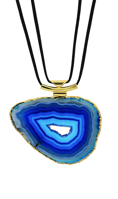 A blue agate necklace with black leather cord with a gold bail with a white background.