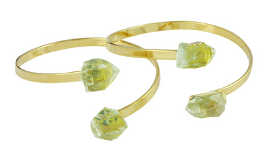 two gold plated citrine bracelets with a point on each end and they are adjustable.